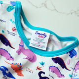 Dinosaur clothes for girls dinosaurs twirl dress with pockets girl clothing twirly pocket dresses science stem paleontology girly pink purple kids pants toddler shirt t-shirt birthday dino party theme gift baby children’s child infant nerd geek nerdy geeky ethical fashion brand style scientist smart smarty pima cotton Peru outfit apparel Kansas company mom-owned circle skirt ballet scoop turquoise back sewn-in label design graphic branding logo skater